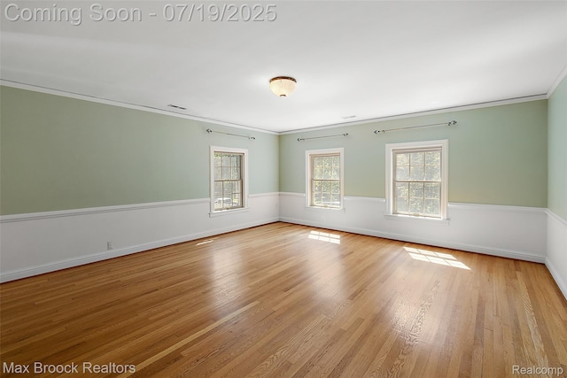 748 Waddington St, Bloomfield Hills, MI 48301 - unfurnished room featuring crown molding and wood finished floors