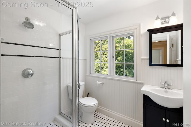 748 Waddington St, Bloomfield Hills, MI 48301 - bathroom with a shower stall, vanity, and wainscoting