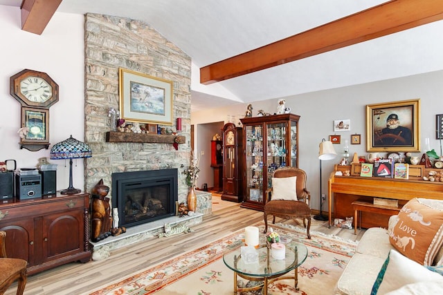 916 Hillcrest Dr, Adrian, MI 49221 - living room with wood finished floors and a stone fireplace