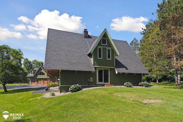 3078 Green Corners Rd, Lapeer, MI 48446 - view of front of home featuring a garage, a front yard, a chimney, and a shingled roof