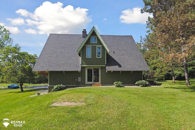 3078 Green Corners Rd, Lapeer, MI 48446 - view of front of property featuring a chimney, a front yard, entry steps, and a shingled roof