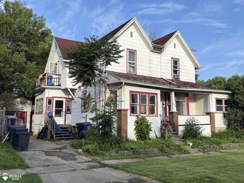 503 W 2nd St, Flint, MI 48503 - view of front of house featuring entry steps and roof with shingles
