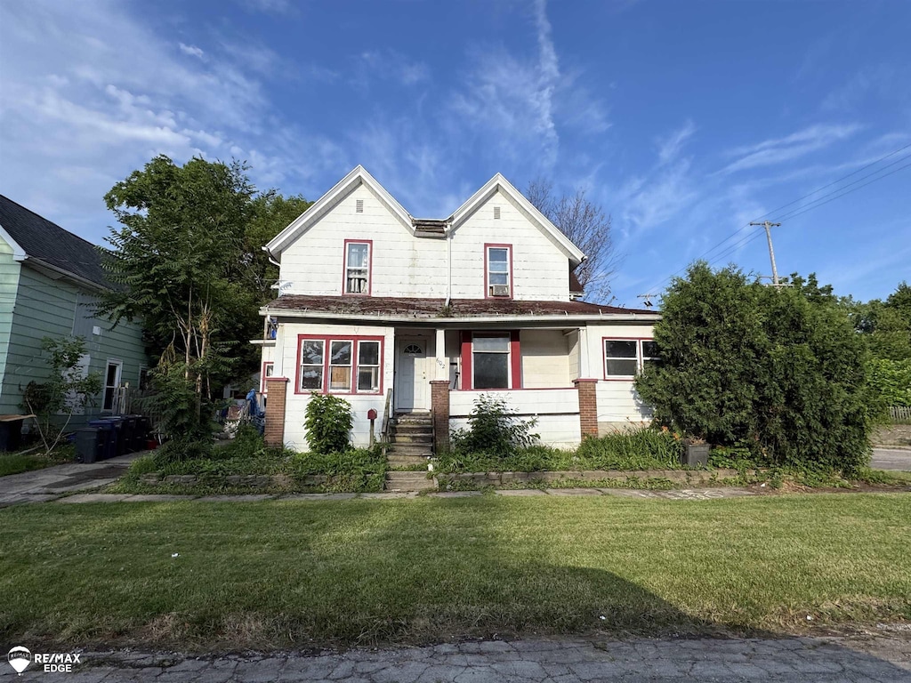503 W 2nd St, Flint, MI 48503 - view of front of house with a front yard