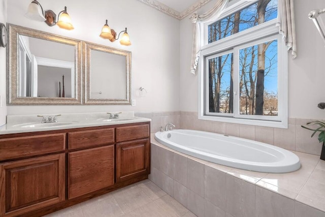 310 Sycamore St, Litchfield, MI 49252 - bathroom featuring a bath and double vanity