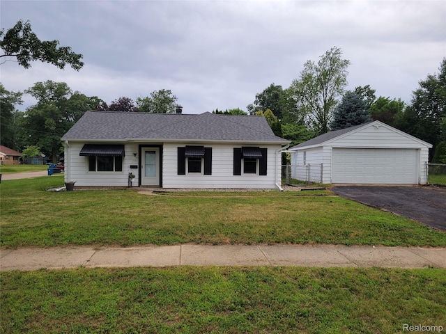 112 Darragh Dr, Battle Creek, MI 49015 - view of front of home with a detached garage and an outbuilding