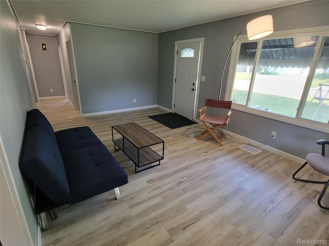 112 Darragh Dr, Battle Creek, MI 49015 - living room with wood finished floors and ornamental molding