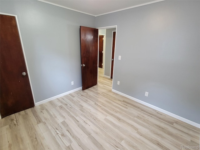 112 Darragh Dr, Battle Creek, MI 49015 - unfurnished room featuring light wood-type flooring and crown molding