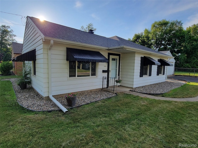 112 Darragh Dr, Battle Creek, MI 49015 - ranch-style home with roof with shingles and a chimney