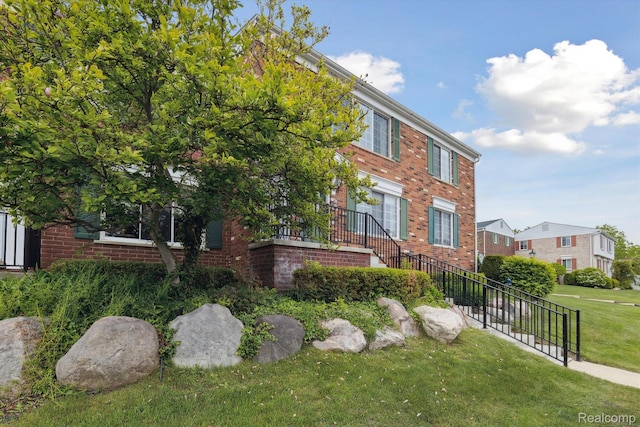 455 Baldwin Ave Unit 203, Rochester, MI 48307 - view of front of property with brick siding and a front yard