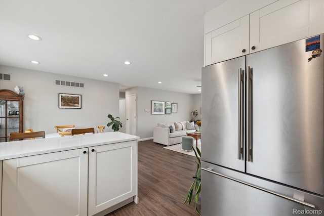 455 Baldwin Ave Unit 203, Rochester, MI 48307 - kitchen with high end fridge, recessed lighting, dark wood-style flooring, and white cabinets