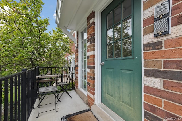 455 Baldwin Ave Unit 203, Rochester, MI 48307 - view of exterior entry featuring brick siding