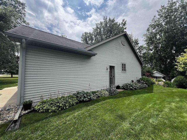 3118 Birch Run, Adrian, MI 49221 - view of property exterior featuring a yard and a shingled roof