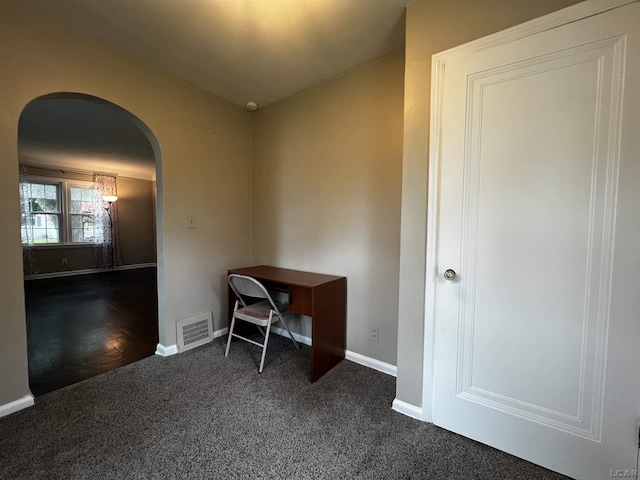 1370 University Ave, Adrian, MI 49221 - home office featuring arched walkways and dark carpet
