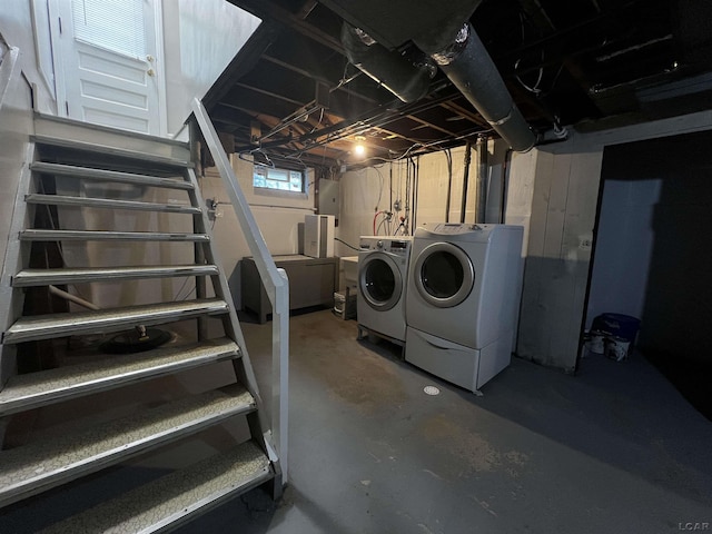 1370 University Ave, Adrian, MI 49221 - basement featuring washer and clothes dryer and stairway