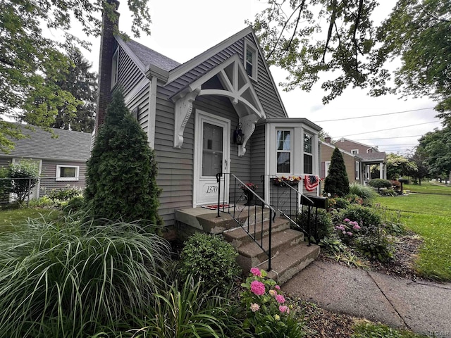 1370 University Ave, Adrian, MI 49221 - view of front of home featuring a chimney