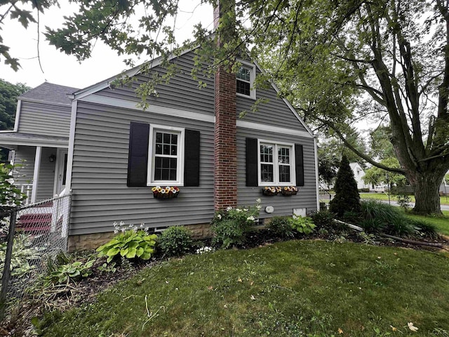 1370 University Ave, Adrian, MI 49221 - view of side of property with a lawn
