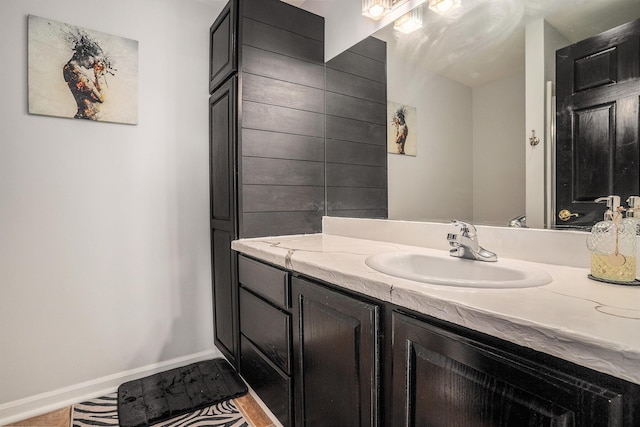 15518 Oak Ridge Dr, Spring Lake, MI 49456 - bathroom with vanity and baseboards