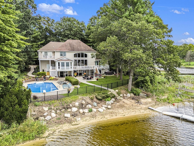15518 Oak Ridge Dr, Spring Lake, MI 49456 - rear view of property with a fenced backyard, a patio area, stairway, and a deck with water view