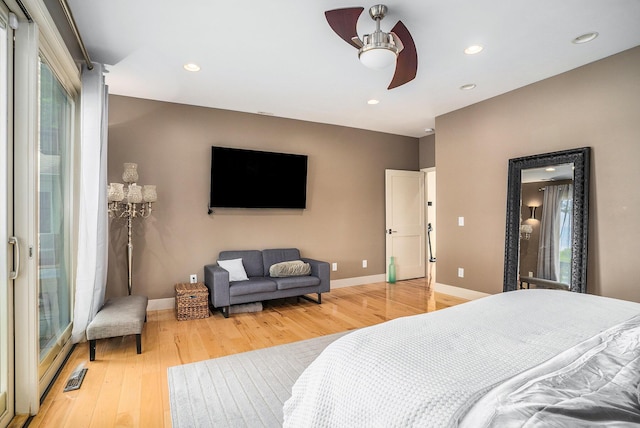 15518 Oak Ridge Dr, Spring Lake, MI 49456 - bedroom with light wood finished floors, recessed lighting, and a ceiling fan