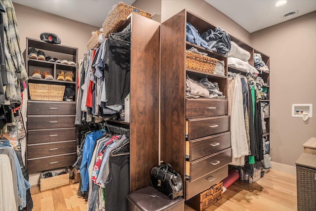 15518 Oak Ridge Dr, Spring Lake, MI 49456 - spacious closet featuring wood finished floors