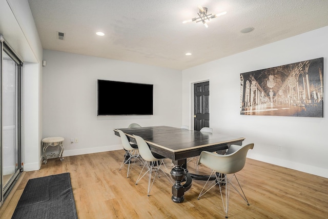 15518 Oak Ridge Dr, Spring Lake, MI 49456 - dining space with light wood-style floors and recessed lighting