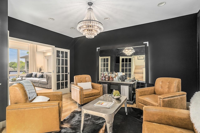 15518 Oak Ridge Dr, Spring Lake, MI 49456 - living room featuring a chandelier, recessed lighting, and wood finished floors