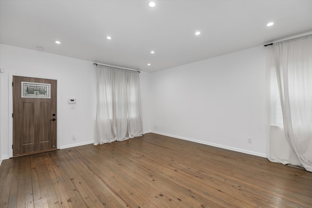 21560 Poinciana St, Southfield, MI 48033 - empty room with hardwood / wood-style floors and recessed lighting