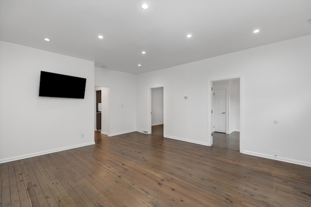 21560 Poinciana St, Southfield, MI 48033 - unfurnished room with dark wood-style flooring and recessed lighting