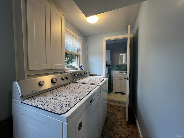 231 Willis Rd, Saline, MI 48176 - laundry room with washing machine and clothes dryer and cabinet space