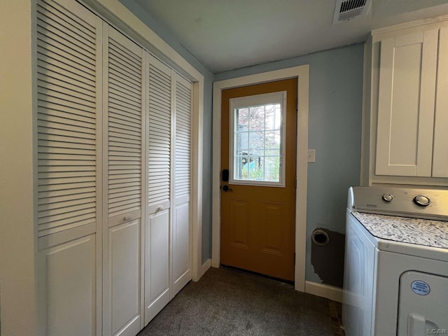 231 Willis Rd, Saline, MI 48176 - laundry room with washer / dryer, dark carpet, and cabinet space
