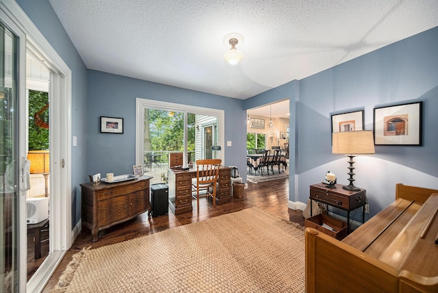 14300 Ridgemont St, Gregory, MI 48137 - office with a textured ceiling and wood finished floors