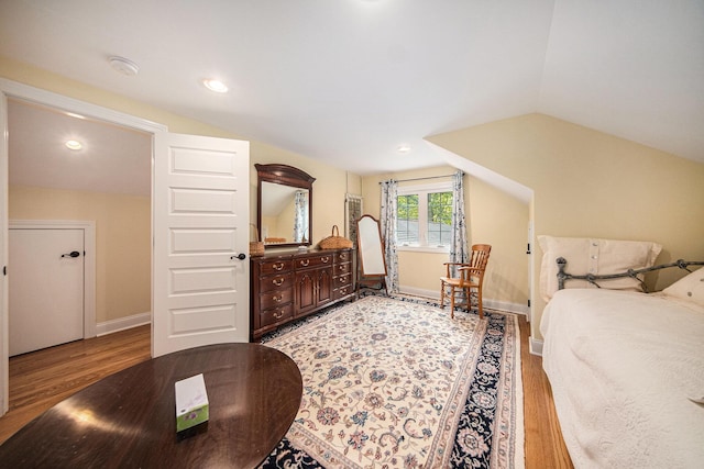 14300 Ridgemont St, Gregory, MI 48137 - bedroom featuring wood finished floors, vaulted ceiling, and recessed lighting
