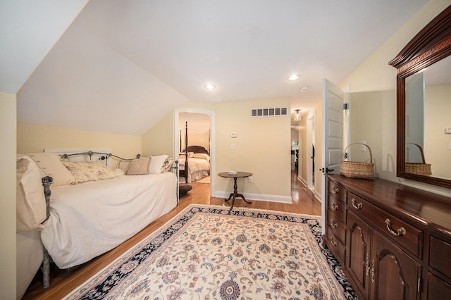 14300 Ridgemont St, Gregory, MI 48137 - bedroom featuring wood finished floors, vaulted ceiling, and recessed lighting