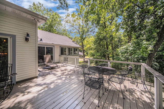 14300 Ridgemont St, Gregory, MI 48137 - wooden terrace with outdoor dining space