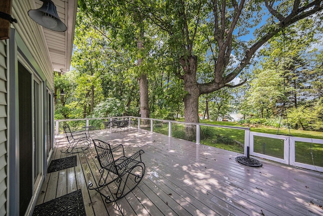 14300 Ridgemont St, Gregory, MI 48137 - wooden terrace with view of wooded area