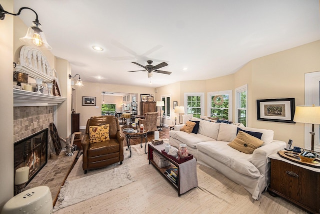 14300 Ridgemont St, Gregory, MI 48137 - living area with recessed lighting, wood finished floors, ceiling fan, and a fireplace