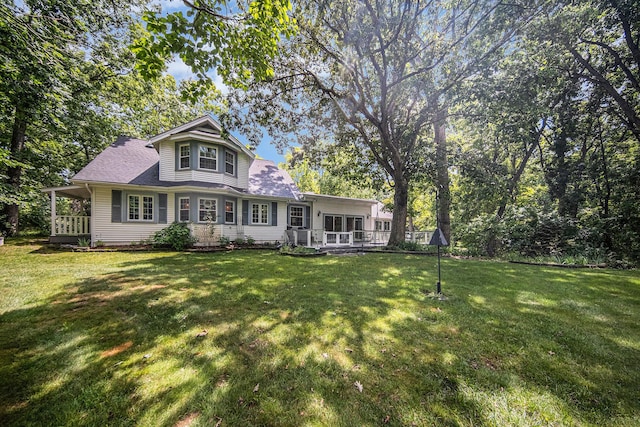 14300 Ridgemont St, Gregory, MI 48137 - view of front of house with a front lawn and a deck