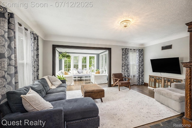 2577 John R Rd, Rochester Hills, MI 48307 - living area with a textured ceiling and wood finished floors