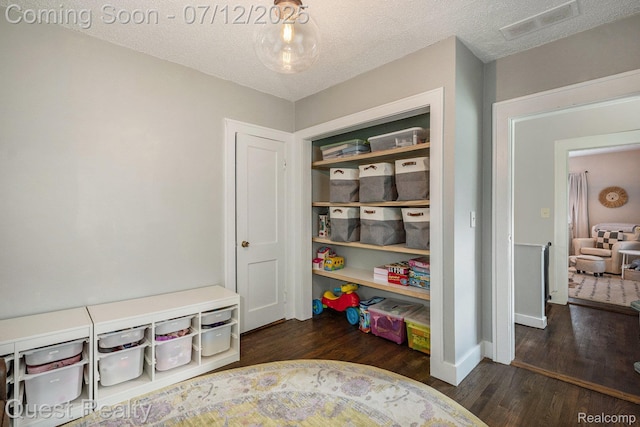 2577 John R Rd, Rochester Hills, MI 48307 - playroom featuring wood finished floors and a textured ceiling
