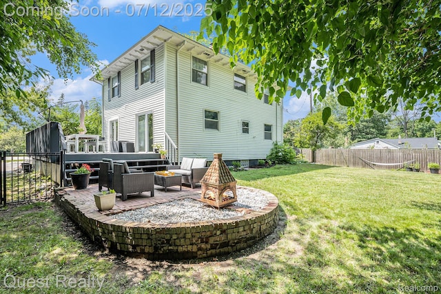 2577 John R Rd, Rochester Hills, MI 48307 - rear view of house with a fire pit