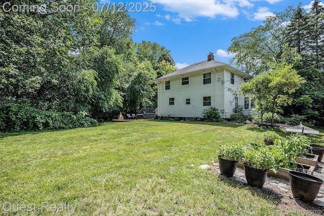 2577 John R Rd, Rochester Hills, MI 48307 - view of grassy yard featuring a vegetable garden