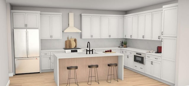 7919 Grand St, Dexter, MI 48130 - kitchen featuring high end refrigerator, wall chimney exhaust hood, light wood-style flooring, a kitchen island with sink, and light countertops