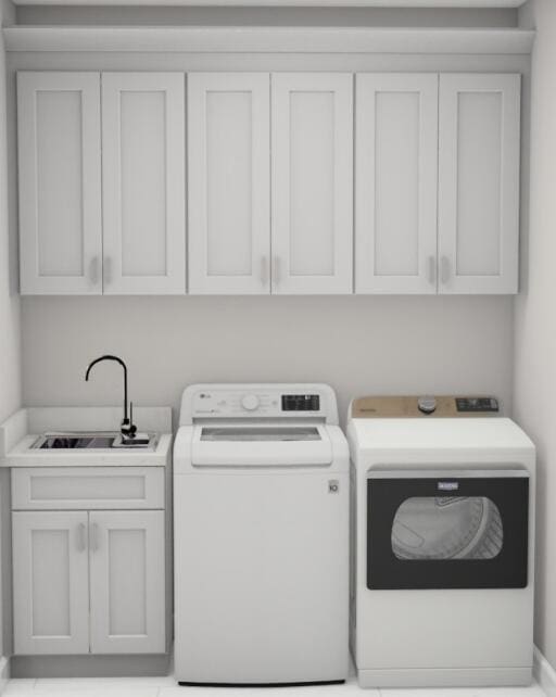 7919 Grand St, Dexter, MI 48130 - laundry area featuring washer and dryer and cabinet space