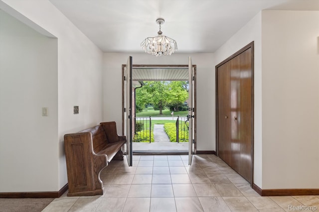 1726 Black Maple Dr, Rochester Hills, MI 48309 - entrance foyer featuring a chandelier and light tile patterned floors