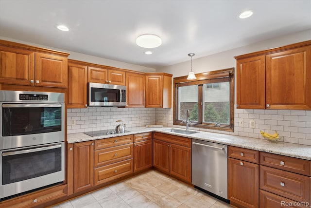 1726 Black Maple Dr, Rochester Hills, MI 48309 - kitchen with appliances with stainless steel finishes, brown cabinetry, light stone countertops, and recessed lighting
