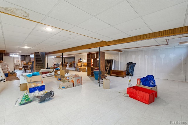 1726 Black Maple Dr, Rochester Hills, MI 48309 - finished basement with stairs, tile patterned floors, and a paneled ceiling