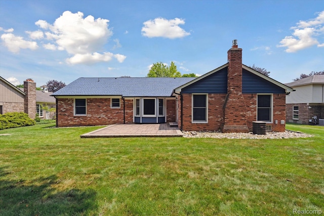 1726 Black Maple Dr, Rochester Hills, MI 48309 - rear view of house featuring brick siding, a yard, and a patio