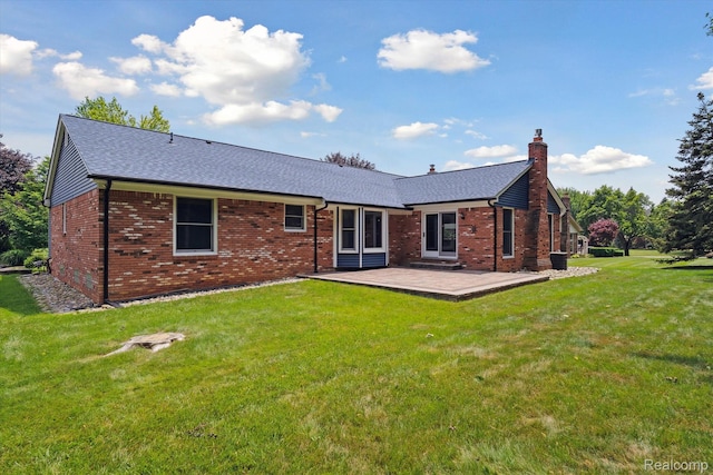 1726 Black Maple Dr, Rochester Hills, MI 48309 - back of property featuring a chimney, roof with shingles, a lawn, and brick siding