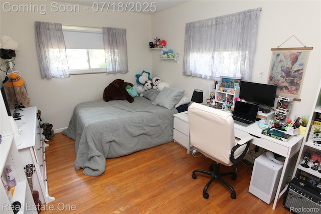 483 Rochdale Dr S, Rochester Hills, MI 48309 - bedroom featuring wood finished floors and an office area