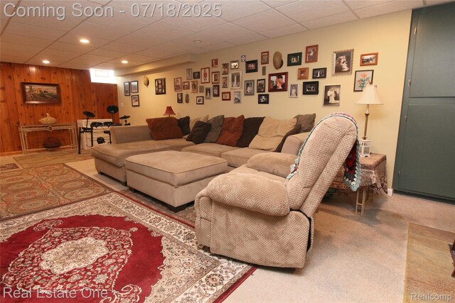 483 Rochdale Dr S, Rochester Hills, MI 48309 - living area featuring wood walls, a drop ceiling, recessed lighting, and carpet